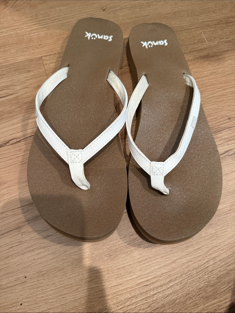 Sanuk Women’s Brown Footbed White Strap Flip Flops